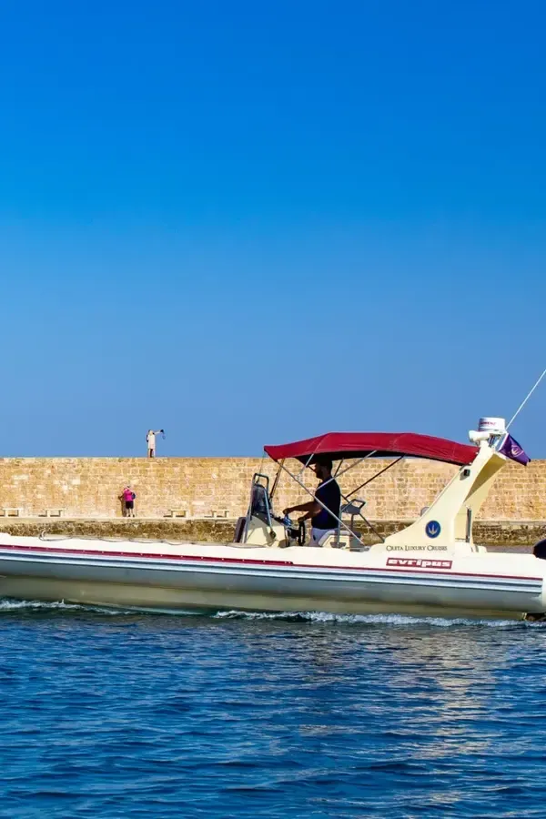 Nino at chania old harbor lighthouse