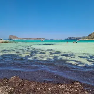 Vast view of the turquoise lagoon and bright white sandy beach at Balos, western Crete