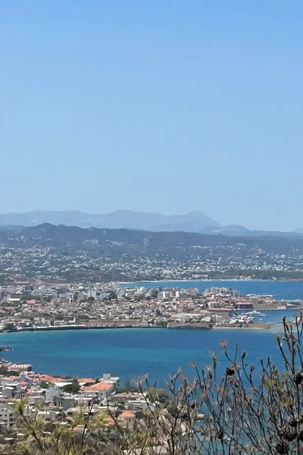 Historic views of Chania's Old Town architecture along the picturesque Venetian Harbour waterfront.