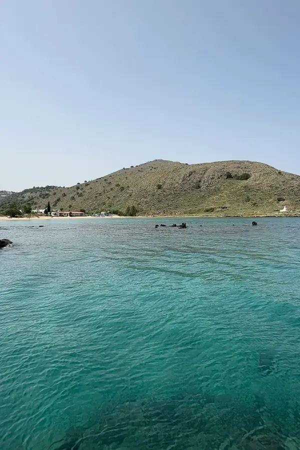 The coastline of Georgioupoli, featuring golden sand beaches meeting the deep blue Aegean Sea.