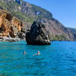 Coastal view showing deep blue waters and rugged land near the owners' property on the Cretan coast.