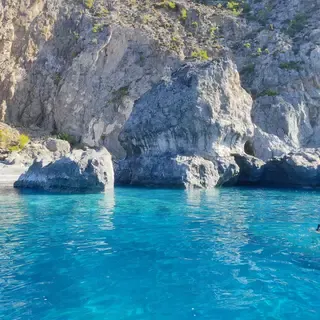 Mandrakia village houses and clear blue waters overlooking the southern coast of Crete.